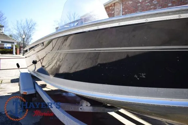 Slide: The Image of 2015 Lund 1800 Alaskan boat on trailer, side view, outdoors. - 30