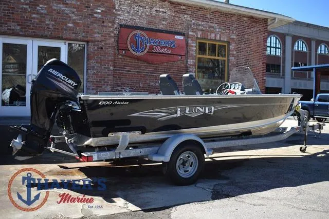 Slide: The Image of 2015 Lund 1800 Alaskan boat on trailer, parked outside Thayer's Marine. - 4