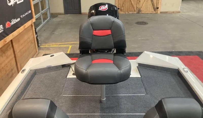 Slide: The Image of 2025 Tracker Pro Team™ 190 boat interior with gray and red seating. - 10