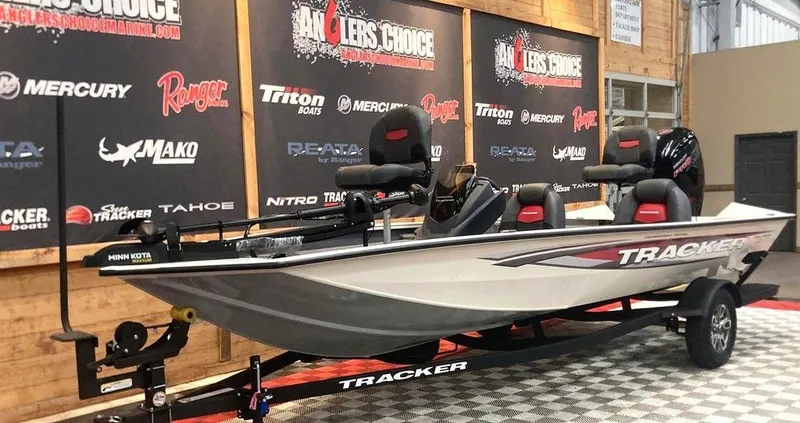 Slide: The Image of 2025 Tracker Pro Team™ 190 fishing boat on display at Anglers Choice event. - 11