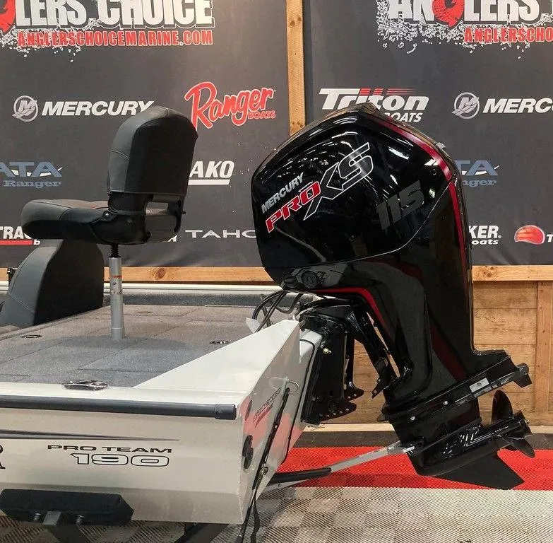 Slide: The Image of 2025 Tracker Pro Team 190 boat with Mercury Pro XS engine displayed indoors. - 3