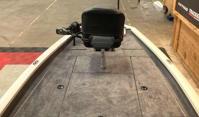 Slide: The Image of 2025 Tracker Pro Team™ 190 boat deck with seat and trolling motor. - 8