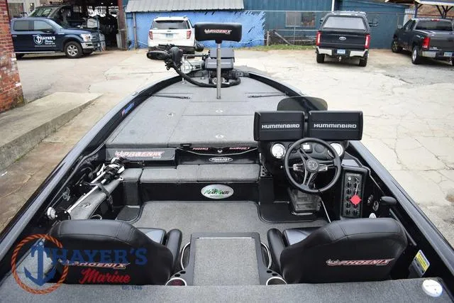 Slide: The Image of 2019 Phoenix Bass Boats 920 interior with dual Humminbird displays and steering wheel. - 11