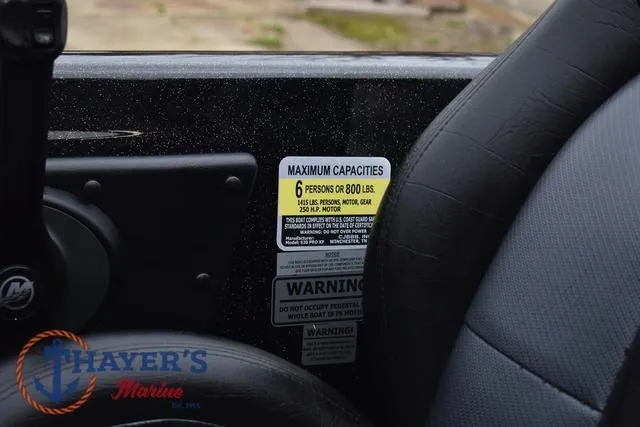 Slide: The Image of 2019 Phoenix Bass Boats 920 capacity label, showing 6-person or 800 lbs limit. - 15