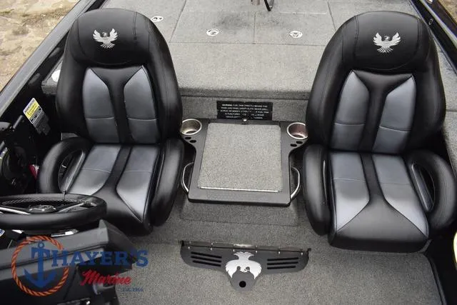 Slide: The Image of 2019 Phoenix Bass Boats 920 interior with dual black seats and center console. - 17