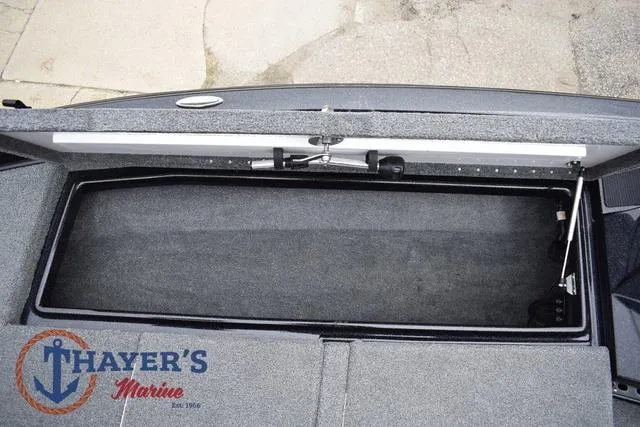 Slide: The Image of 2019 Phoenix Bass Boats 920 storage compartment, Thayer's Marine logo visible. - 28