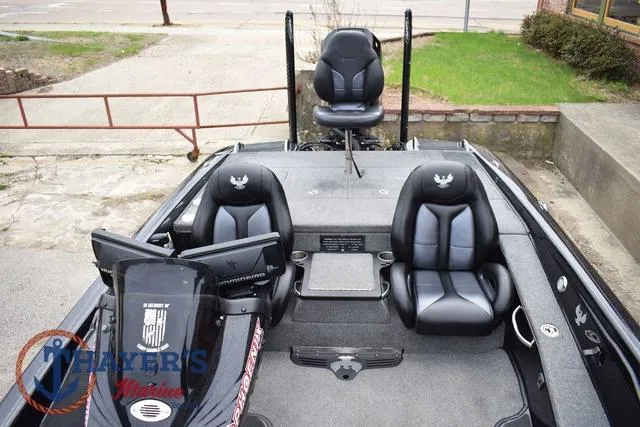 Slide: The Image of 2019 Phoenix Bass Boats 920 interior with black seats and fishing equipment. - 32
