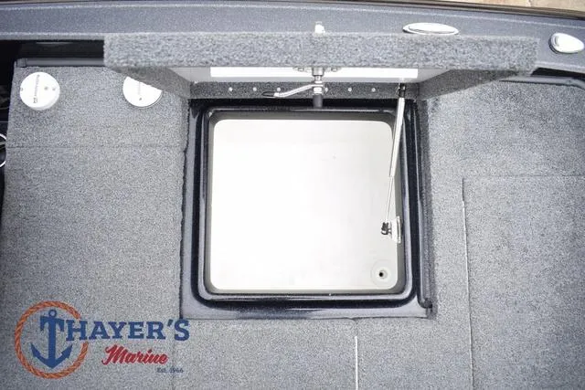 Slide: The Image of 2019 Phoenix Bass Boats 920 storage compartment with Thayer's Marine logo. - 35