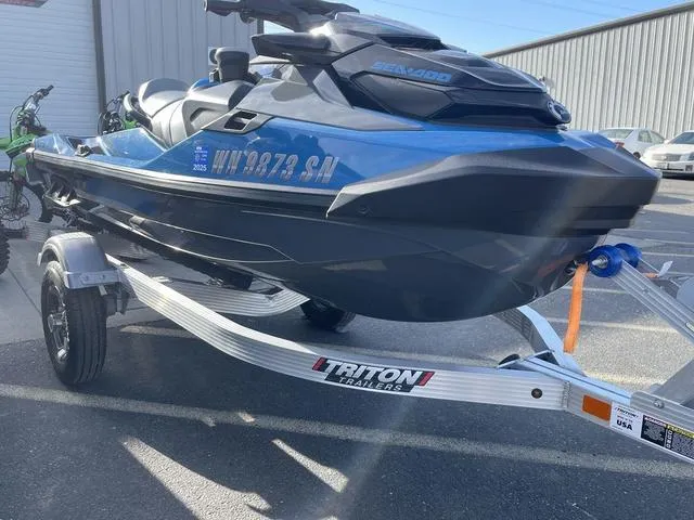 Slide: The Image of 2018 Sea-Doo Waverunner GTX on Triton trailer, parked outdoors. - 13