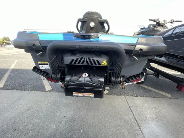 Slide: The Image of 2018 Sea-Doo Waverunner GTX rear view in a parking lot. - 9