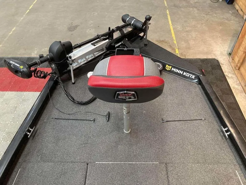 Slide: The Image of 2018 Ranger RT188 boat deck with Minn Kota trolling motor and red seat. - 6