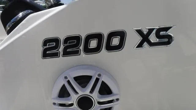 Slide: The Image of Close-up of 2025 Bulls Bay 2200XS boat model logo and speaker. - 13