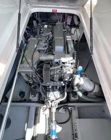 Slide: The Image of Engine compartment of a 2004 Mainship 30 Pilot Rum Runner boat. - 22