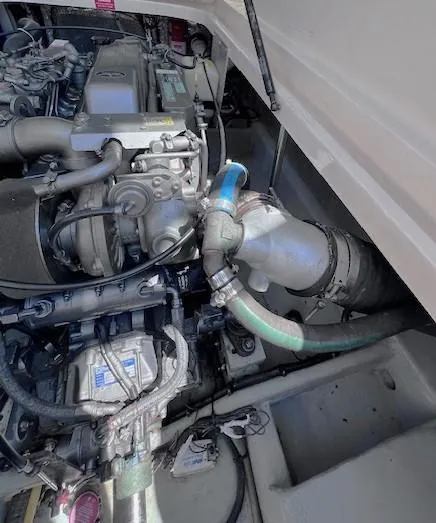 Slide: The Image of Engine compartment of a 2004 Mainship 30 Pilot Rum Runner boat. - 25