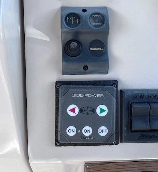 Slide: The Image of Control panel on a 2004 Mainship 30 Pilot Rum Runner boat. - 27