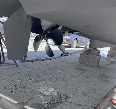 Slide: The Image of Underwater view of 2004 Mainship 30 Pilot Rum Runner propeller and rudder. - 29