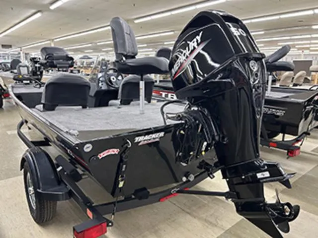 Slide: The Image of 2025 Tracker BASS TRACKER® Classic XL boat with Mercury engine in showroom. - 10