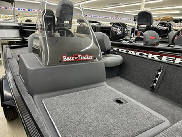 Slide: The Image of 2025 Tracker BASS TRACKER® Classic XL boat interior with seating and console. - 5
