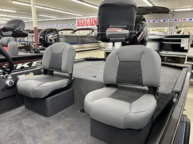 Slide: The Image of 2025 Tracker BASS TRACKER® Classic XL boat interior with gray seating in showroom. - 9