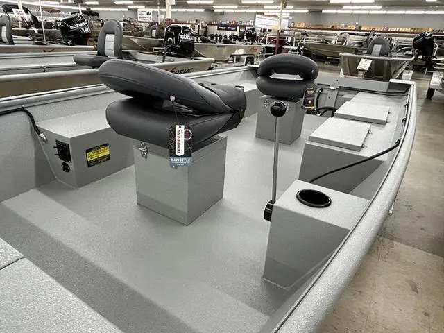 Slide: The Image of 2025 XTREME BOATS River Skiff 1548SS interior with seating and storage compartments. - 3