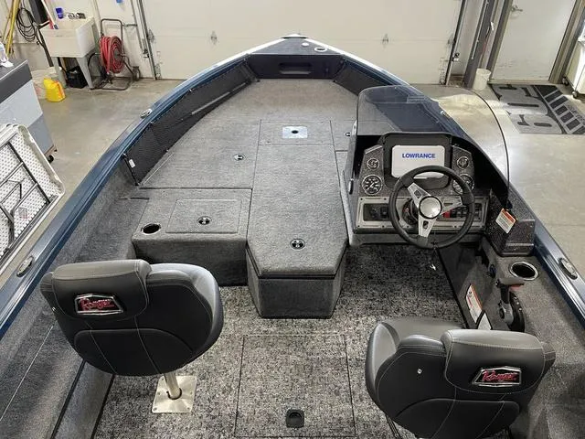 Slide: The Image of 2025 Ranger VS1782SC Angler boat interior with steering console and seating. - 14