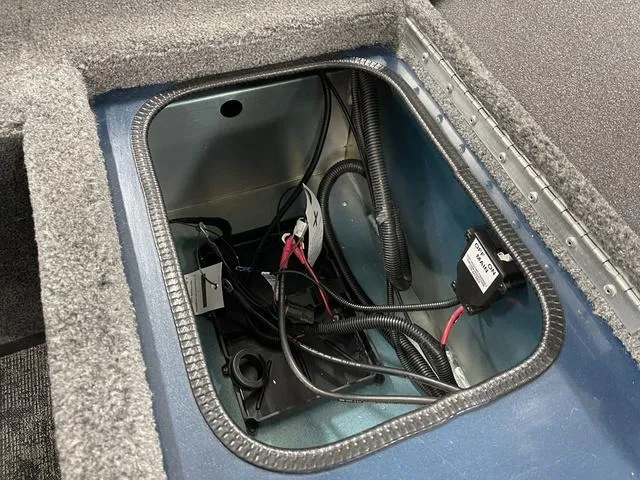 Slide: The Image of 2025 Ranger VS1782SC Angler boat compartment with wiring and components. - 34