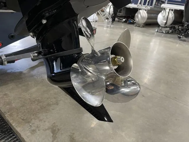 Slide: The Image of 2025 Ranger VS1782SC Angler boat propeller in a showroom setting. - 7