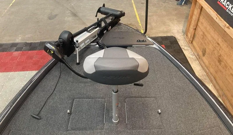 Slide: The Image of 2025 Nitro Z21 XL boat deck with seat and trolling motor. - 7