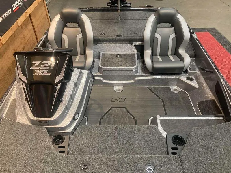 Slide: The Image of 2025 Nitro Z21 XL boat interior with dual seats and sleek design. - 9