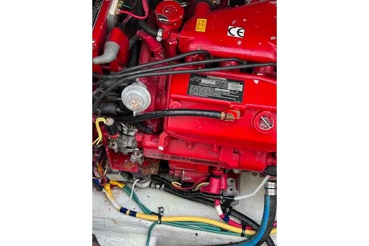 Slide: The Image of Red engine of 2007 Chris-Craft Corsair 36 boat with visible wiring and components. - 15