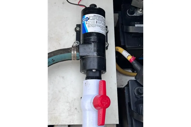 Slide: The Image of Jabsco macerator pump in 2007 Chris-Craft Corsair 36 boat engine compartment. - 22