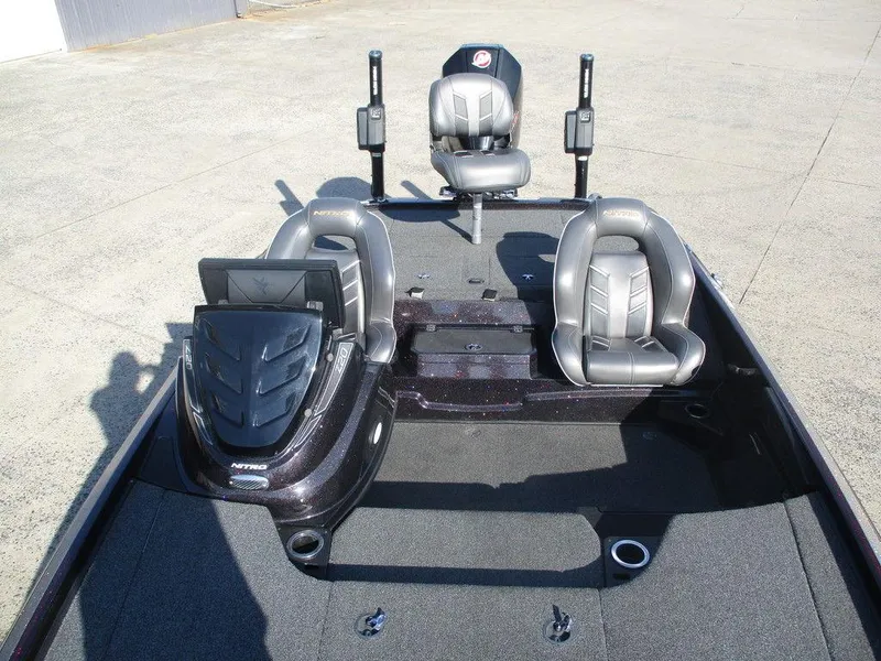 Slide: The Image of 2019 Nitro Z20 boat interior with three seats and control panel. - 5