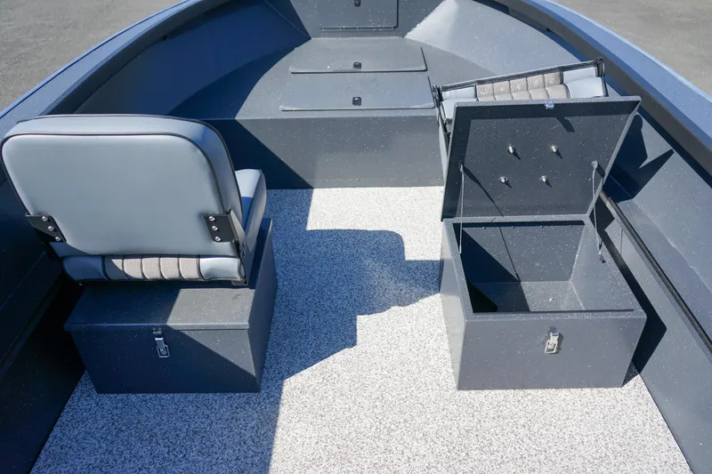 Slide: The Image of 2025 Alumaweld Adventurer 20 boat interior with seating and storage compartments. - 19