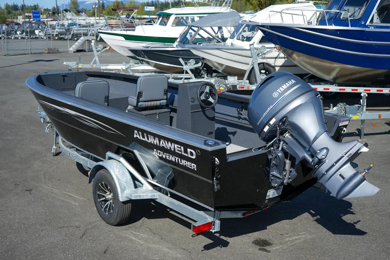 Slide: The Image of 2025 Alumaweld Adventurer 20 boat with Yamaha outboard motor on a trailer. - 4