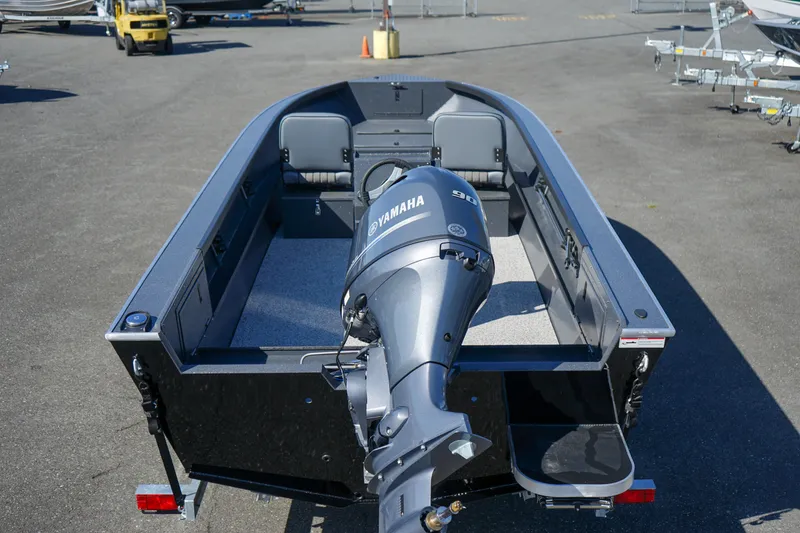 Slide: The Image of 2025 Alumaweld Adventurer 20 boat with Yamaha outboard motor, parked on a trailer. - 5