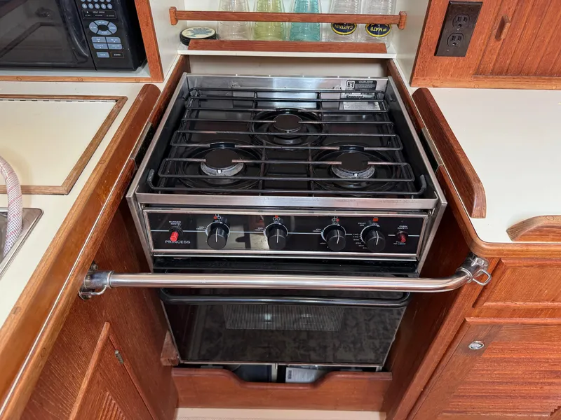 Slide: The Image of Stove and oven in 2002 Island Packet 380 yacht kitchen. - 19