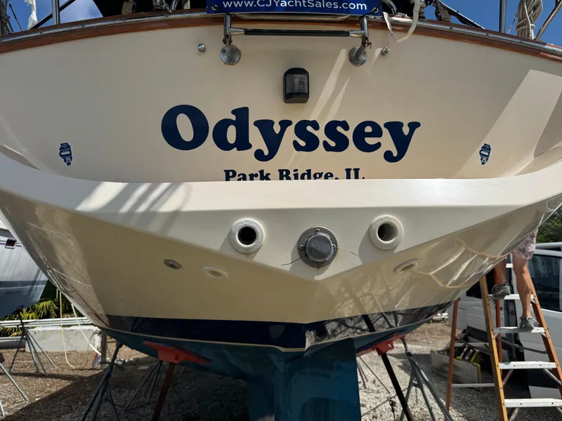 Slide: The Image of Island Packet 380 sailboat named "Odyssey" from Park Ridge, IL, displayed on land. - 2