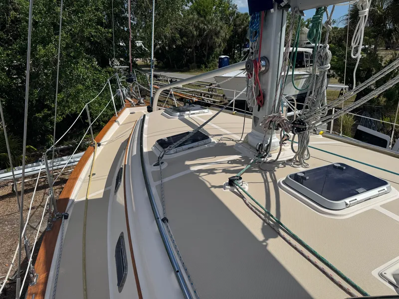 Slide: The Image of Deck view of 2002 Island Packet 380 sailboat with rigging and hatches. - 3