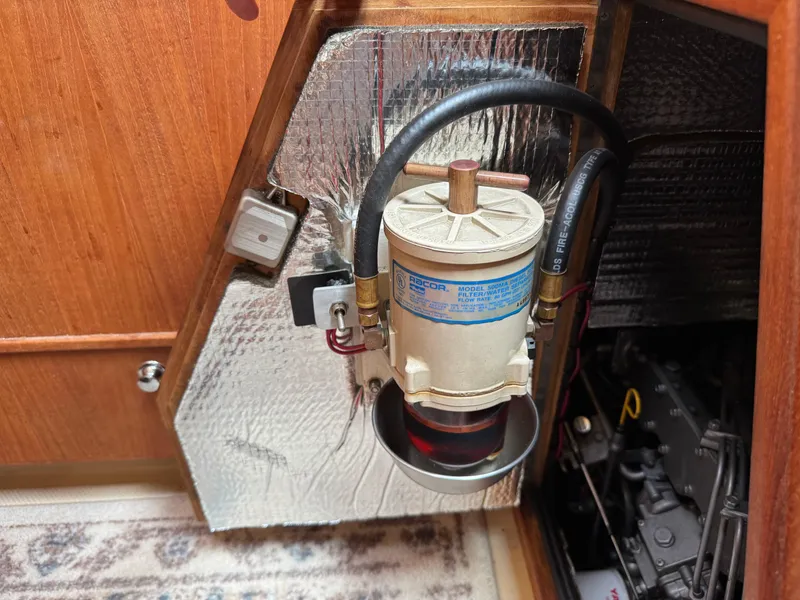 Slide: The Image of Fuel filter system in a 2002 Island Packet 380 sailboat engine compartment. - 32