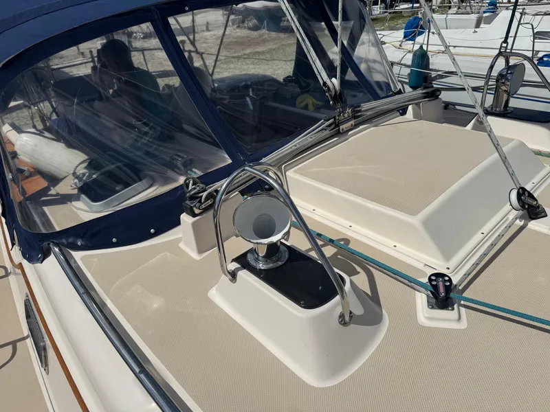 Slide: The Image of 2002 Island Packet 380 sailboat deck with winch and canopy. - 7
