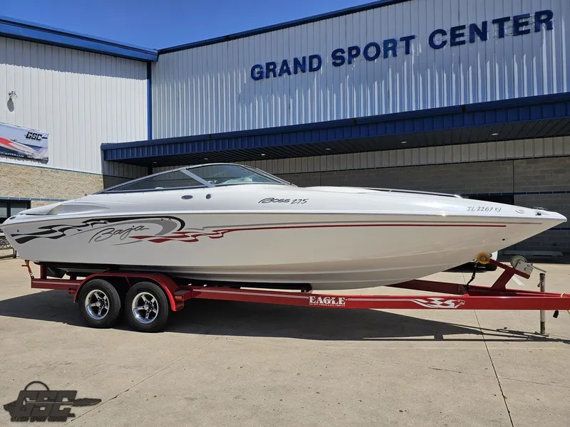 Slide: The Image of 2004 Baja 275 speedboat on trailer at Grand Sport Center. - 13