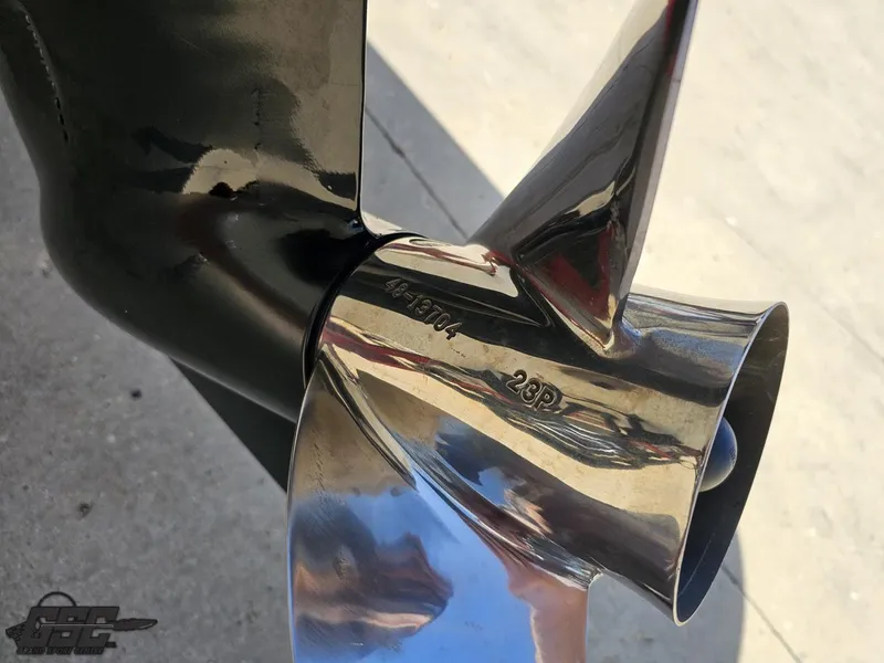 Slide: The Image of Close-up of a shiny boat propeller on a 2004 Baja 275. - 32