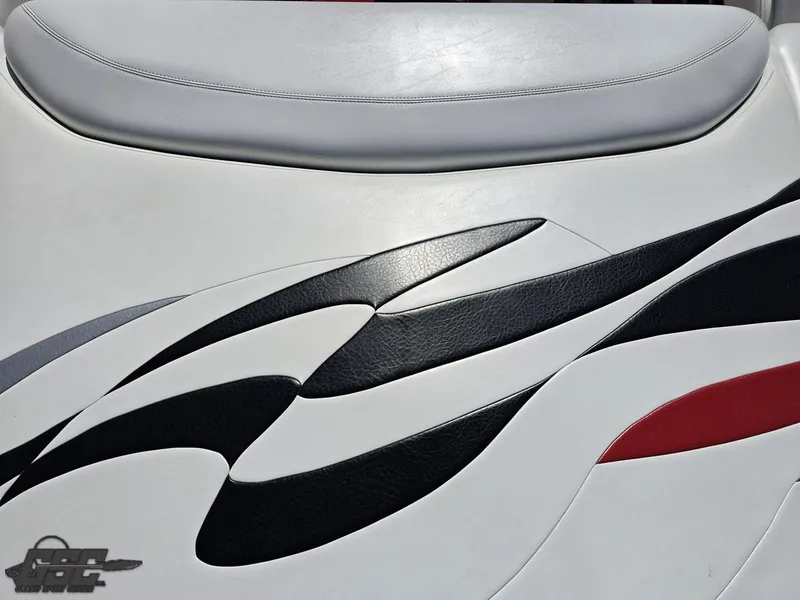 Slide: The Image of 2004 Baja 275 boat seat with stylish black and red design accents. - 39
