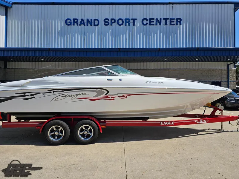 Slide: The Image of 2004 Baja 275 boat on red trailer at Grand Sport Center. - 5
