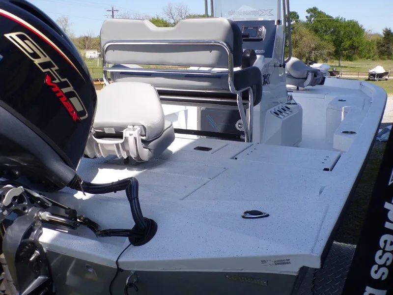 Slide: The Image of 2025 Xpress H20BAY boat with sleek design and powerful engine, ideal for fishing and recreation. - 19