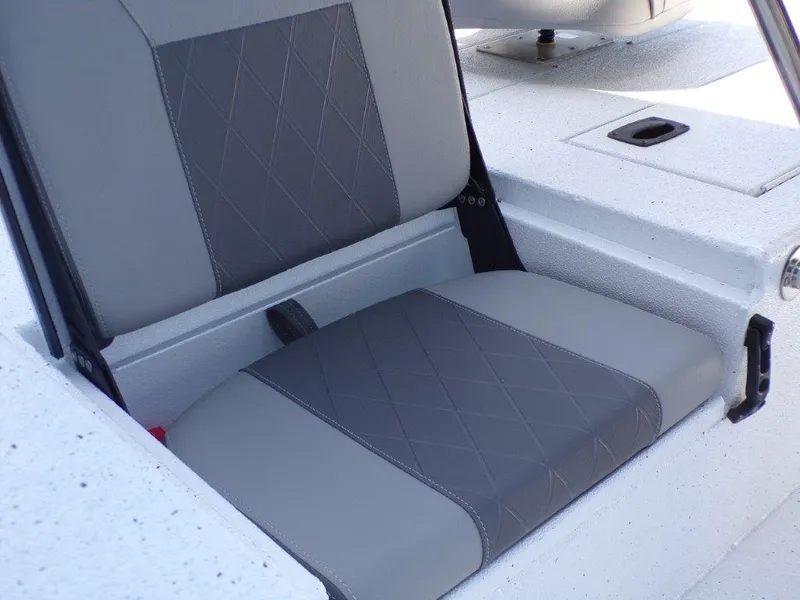 Slide: The Image of 2025 Xpress H20BAY boat seat with gray upholstery and diamond stitching. - 20