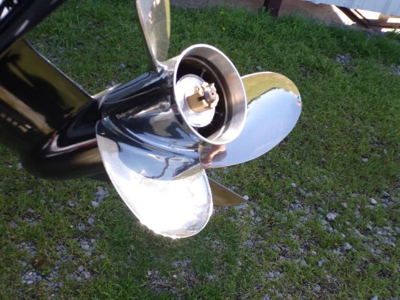 Slide: The Image of Shiny boat propeller on Xpress H20BAY 2025, displayed on grass. - 3