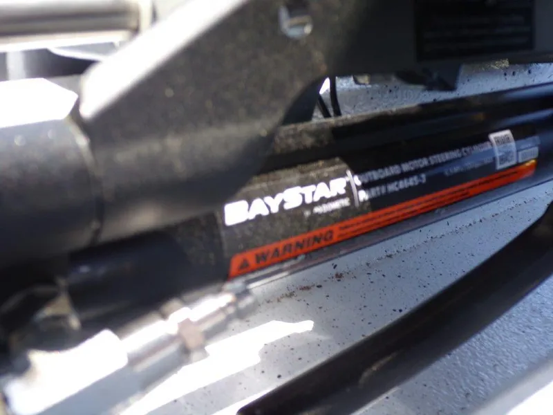 Slide: The Image of BayStar hydraulic motor steering system on 2025 Xpress H20BAY boat. - 4