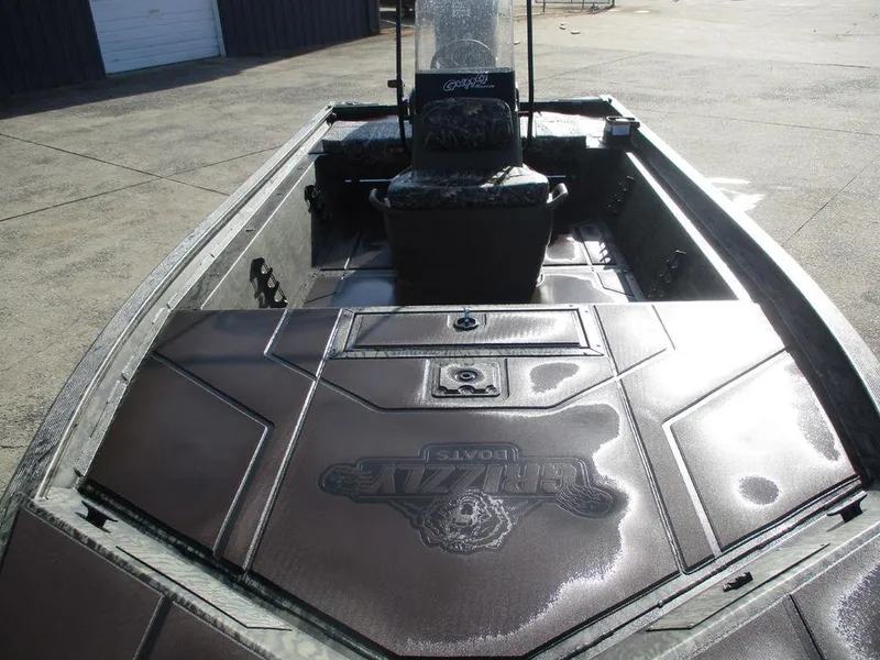 Slide: The Image of 2025 Tracker GRIZZLY® 1860 CC boat interior with sleek design and spacious layout. - 6