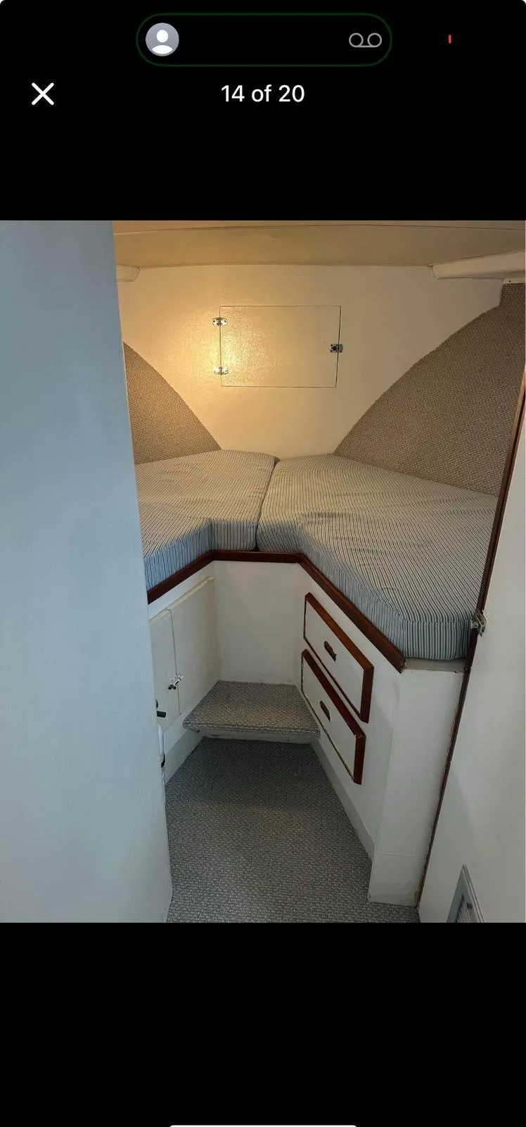 Slide: The Image of 1974 Bertram 42 Motor Yacht cabin with cozy V-berth and storage drawers. - 26